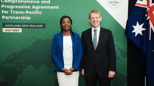 Kemi Badenoch (UK Business and Trade Secretary) with Chris Hipkins (Prime Minister of New Zealand) formally signing the treaty to accede to CPTPP in NZ